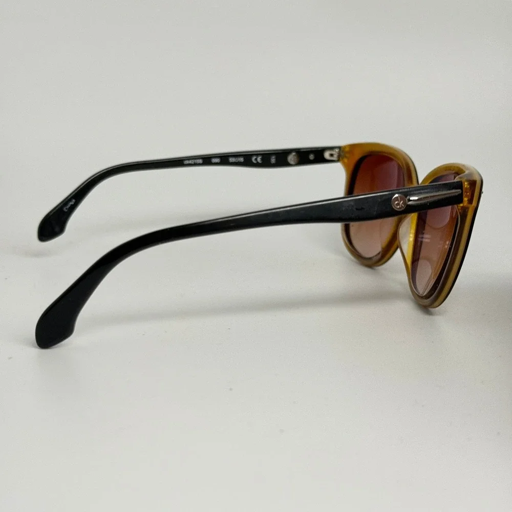 Calvin Klein CK4215S Cat Eye Sunglasses Black Honey Brown Gradient 53-15-135